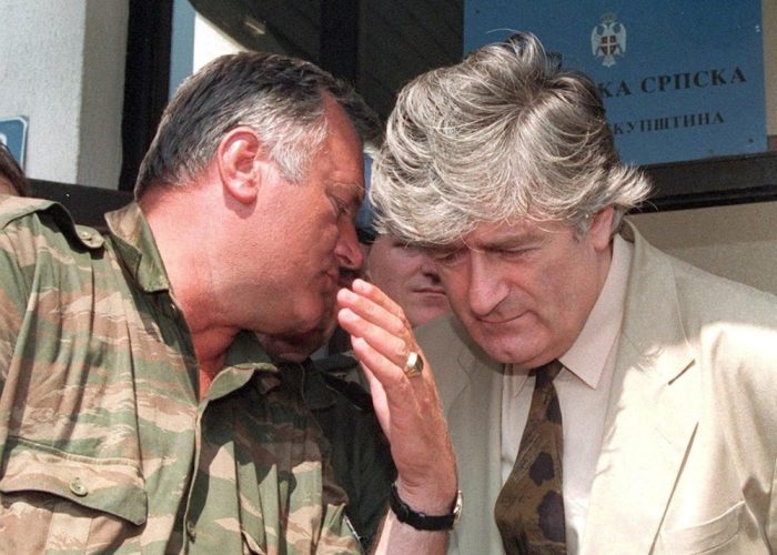 PRI99 - 19930805 - PALE, BOSNIA AND HERCEGOVINA : (FILE) Picture dated 05 August 1993 of Bosnian Serb leader Radovan Karadzic (R) listening to Bosnian Serb Commander Ratko Mladic (L) during a meeting with the press in Pale. Like former Serbian president Slobodan Milosevic, whose trial in The Hague began Tuesday 12 February 2002, Karadzic and Mladic are accused by the UN court of involvement in the slaughter of more then 7,000 Bosnian Muslims in Srebrenica in July 1995, but there is no chance that Bosnian Serb war time military commander Mladic, sought for the alleged war crimes, will turn himself in to the UN war crimes tribunal in The Hague, a high-ranking Serbian government official said Thursday 14 February 2002. EPA-PHOTO/EPA/FILES/STRINGER/ao/rc/ow